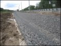 Строительство ЗСД, устройство кюветов на развязке с КАД в районе Выборгского шоссе